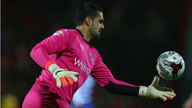 Reading's Adam Federici fires a kick up field in the Championship.