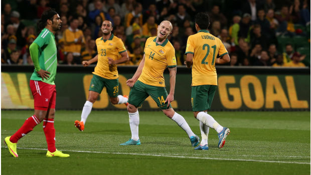 Socceroos midfielder Aaron Mooy celebrates scoring against Bangladesh.