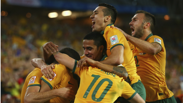 The Socceroos celebrate Massimo's Luongo's opening goal in the Asian Cup final.