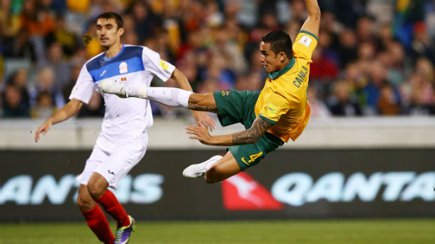 Socceroo Tim Cahill fires a shot against Kyrgyzstan in World Cup qualifying.