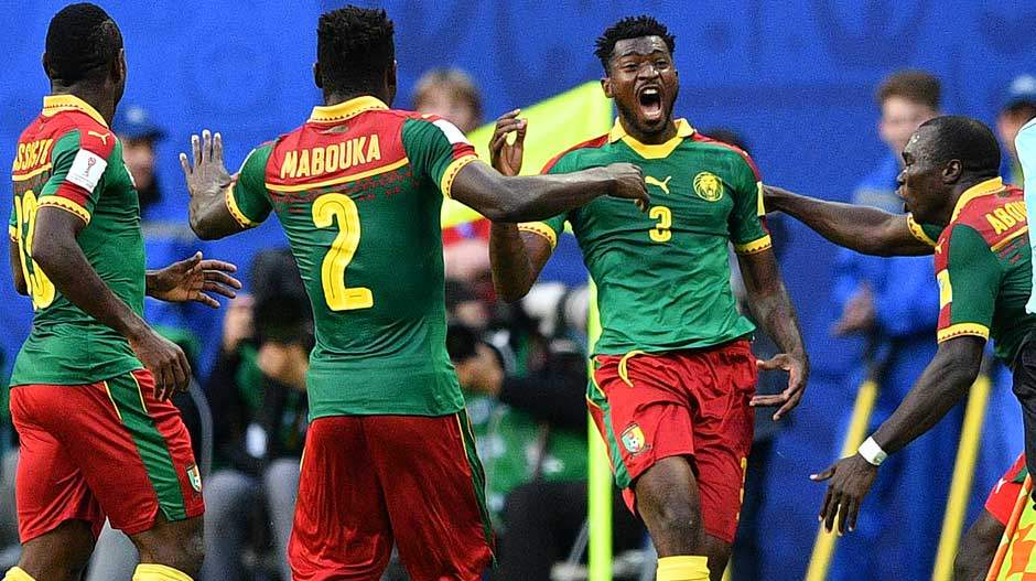 Cameroon players celebrate Andre Zambo Anguissa's goal right on the stroke of half-time to take a 1-0 lead to the break.