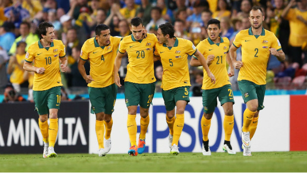 The Socceroos celebrate Trent Sainsbury scoring the opening goal in their Asian Cup semi-final.