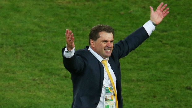 Ange Postecoglou celebrates the Socceroos triumph in the Asian Cup final.