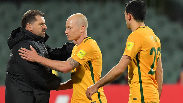 Ange Postecoglou acknowledges Aaron Mooy after Australia's win over Saudi Arabia.