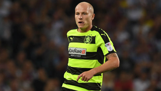 Midfielder Aaron Mooy in action for Huddersfield Town in the Championship.
