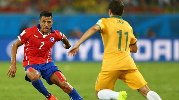 Chilean superstar Alexis Sanchez in action against the Socceroos at the 2014 World Cup.