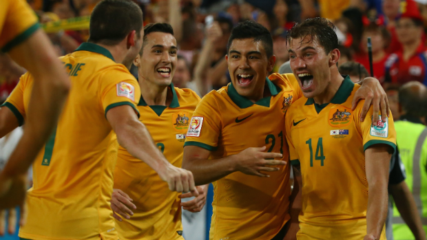 The Socceroos celebrate James Troisi's extra-time winner in the Asian Cup final.