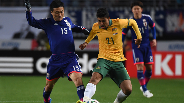 Massimo Luongo on the ball against Japan during a 2014 friendly.