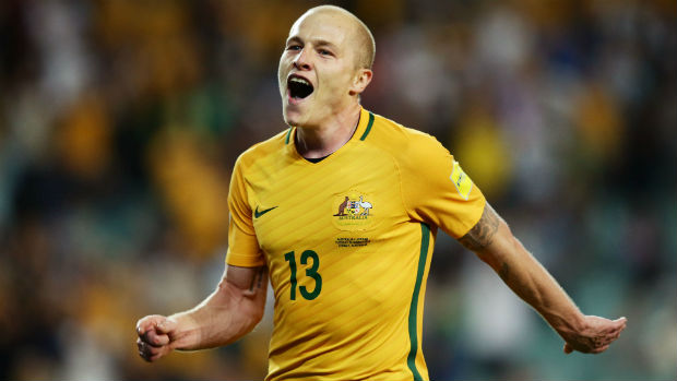 Aaron Mooy celebrates scoring the Caltex Socceroos' second goal against Jordan in a WCQ at Allianz Stadium.