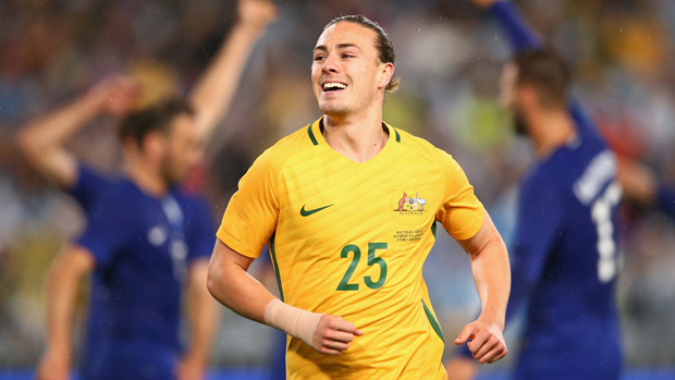 Jackson Irvine celebrates a goal in Australia's friendly win over Greece in 2016.