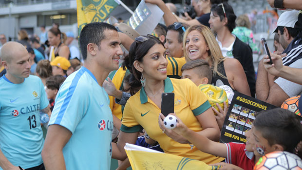 Tim Cahill with fans in Sydney.