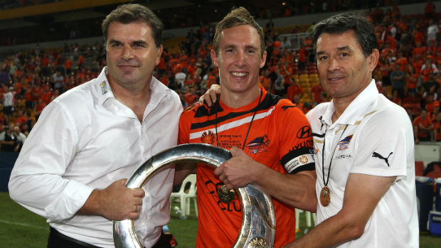 Ange Postecoglou, Matt Smith and Dario Vidosic celebrate Brisbane Roar's 2012 Championship.