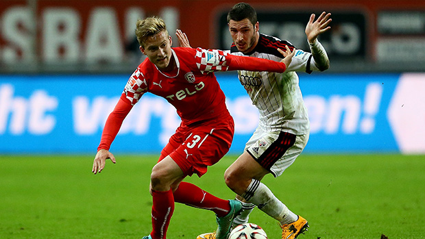Socceroos Ben Halloran and Mathew Leckie compete for the ball in Germany's Second Bundesliga.