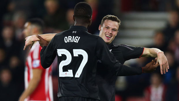 Brad Smith celebrates with Divick Origi after setting up the goal to complete the striker's hat-trick against Southampton in The League Cup.