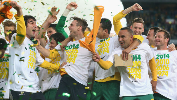 Socceroos celebrate 2014 WCQ win over Iraq.