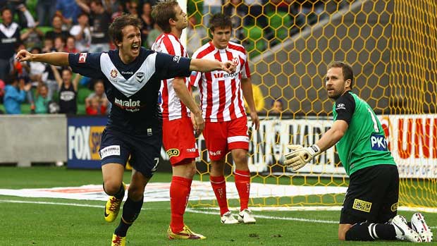 Robbie Kruse celebrates one of his two first-half goals for Victory in the Melbourne Derby. Robbie Kruse celebrates one of his two first-half goals for Victory in the Melbourne Derby.