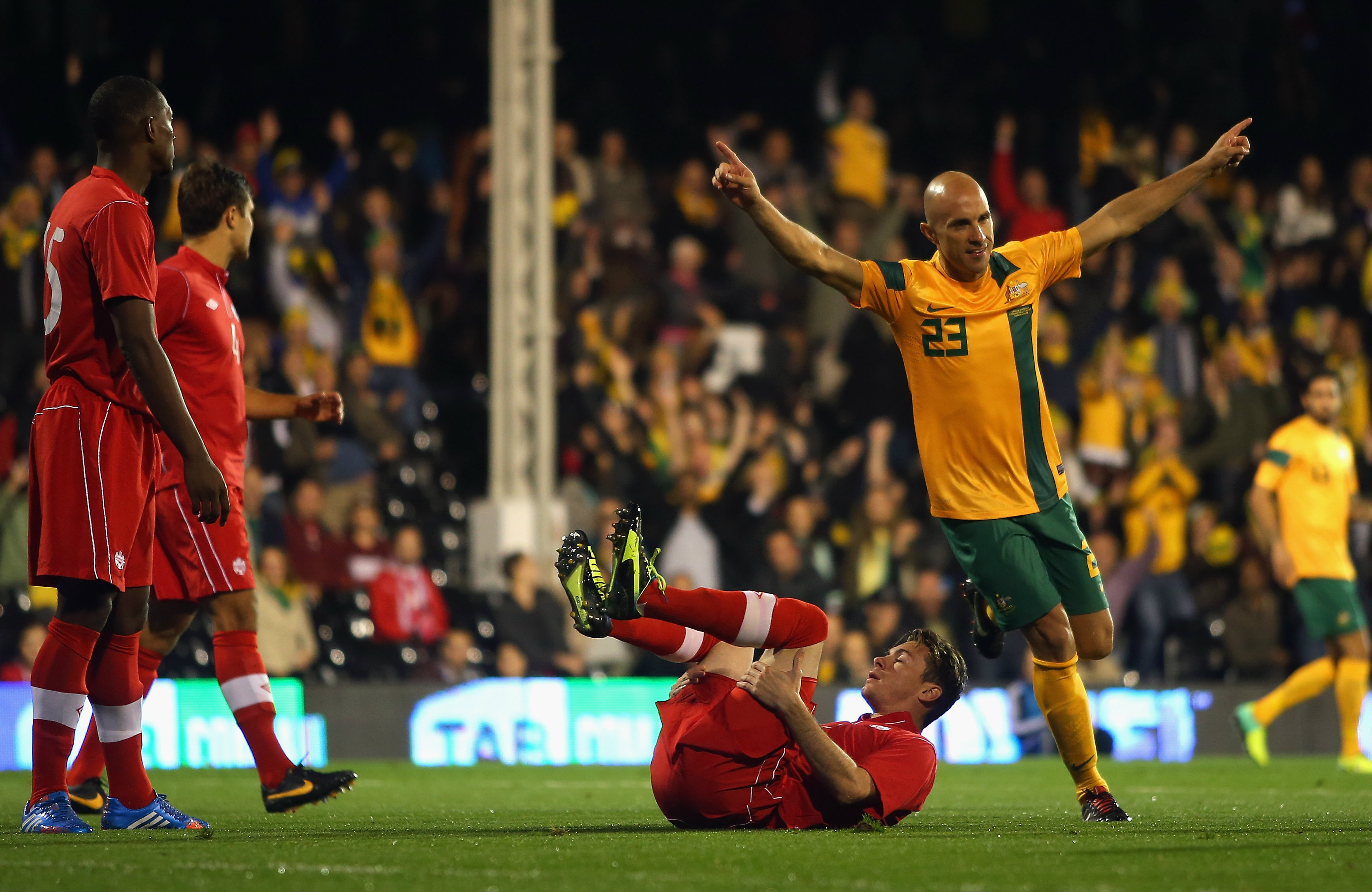 Mark Bresciano celebrates one of Australia's goals against Canada. Mark Bresciano celebrates one of Australia's goals against Canada.