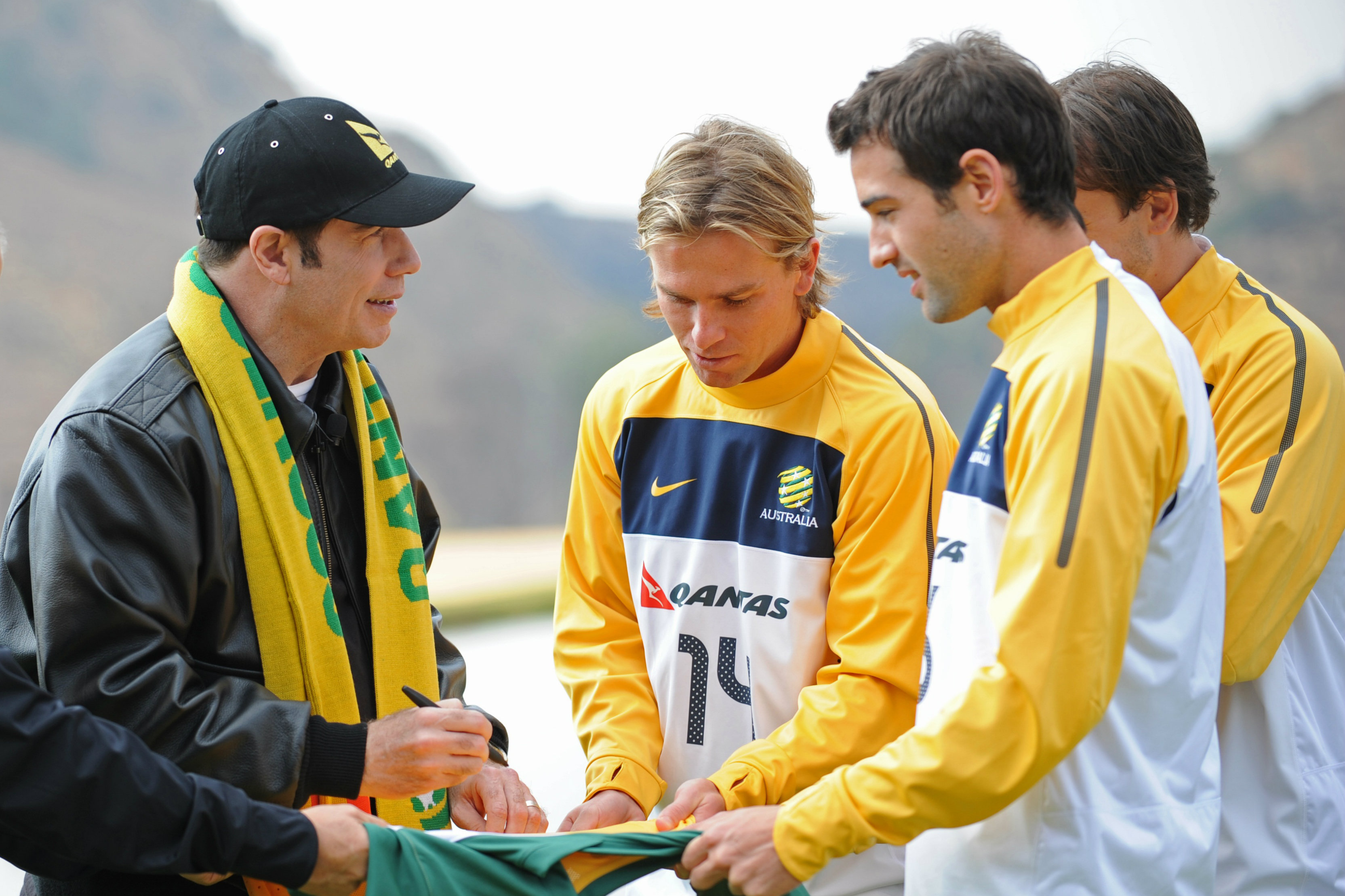 Brett Holman gets his jersey signed by actor John Travolta. Brett Holman gets his jersey signed by actor John Travolta.