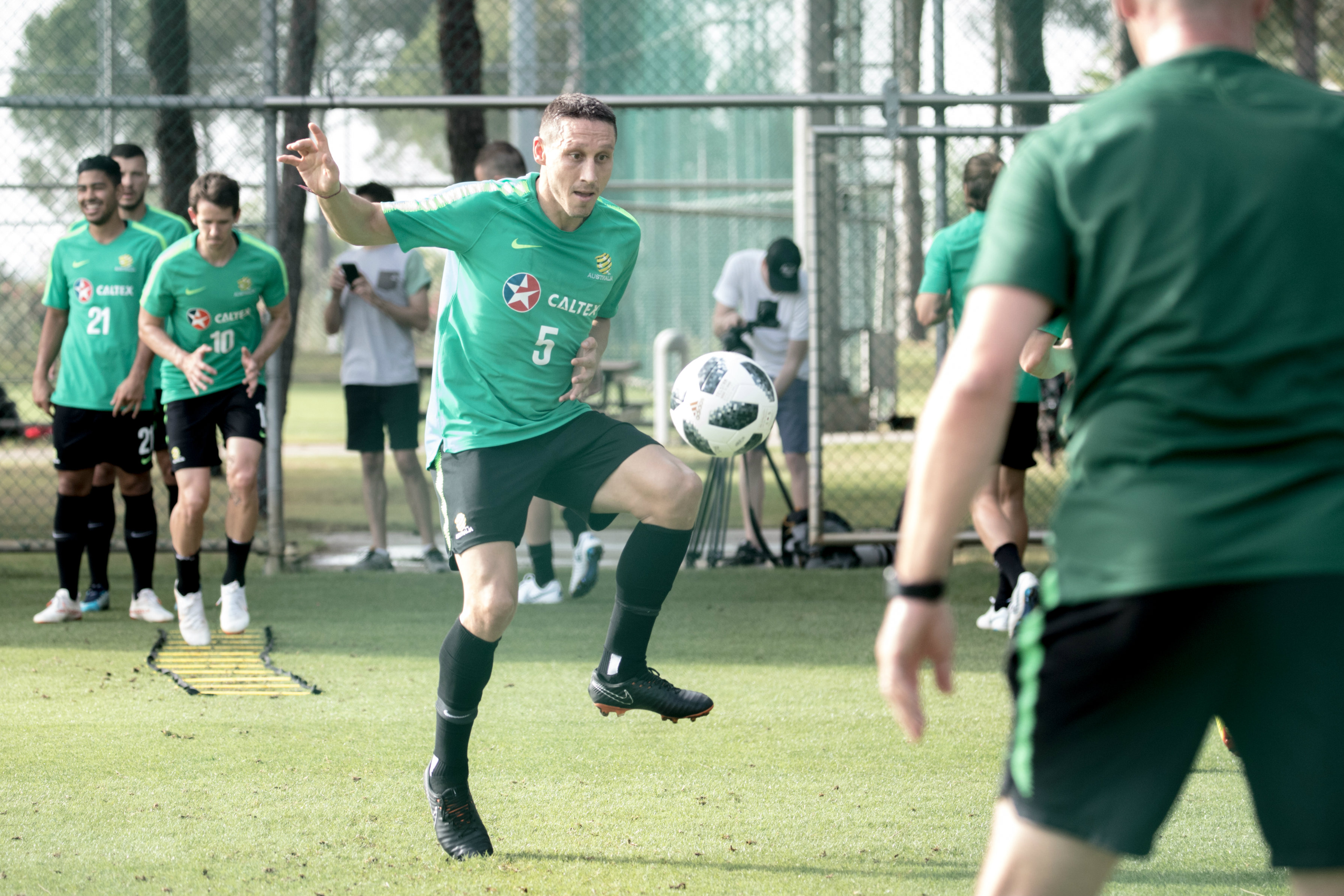 Mark Milligan with the side-foot volley. Mark Milligan with the side-foot volley.