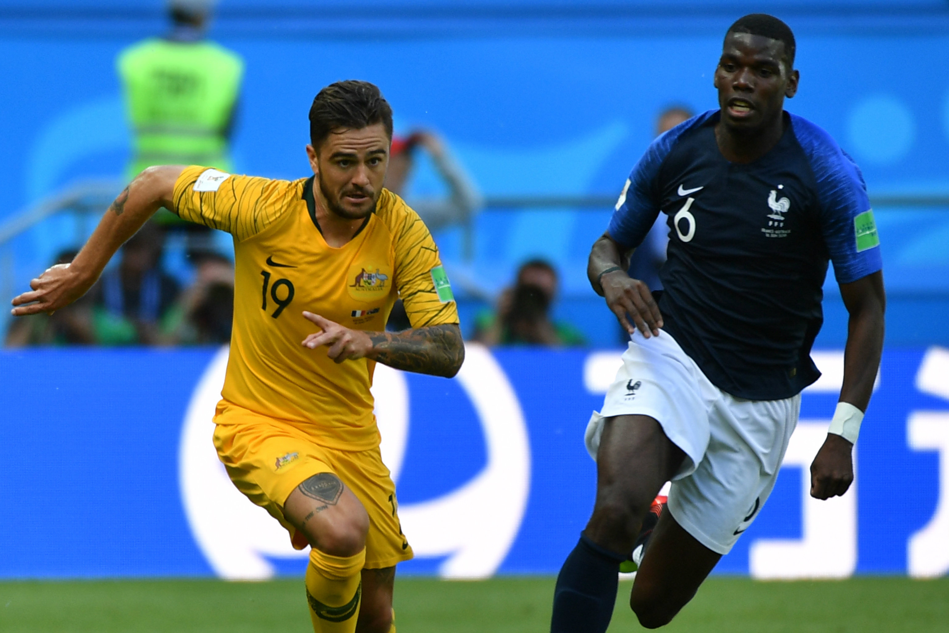 Josh Risdon races clear from France's Paul Pogba. Josh Risdon races clear from France's Paul Pogba.
