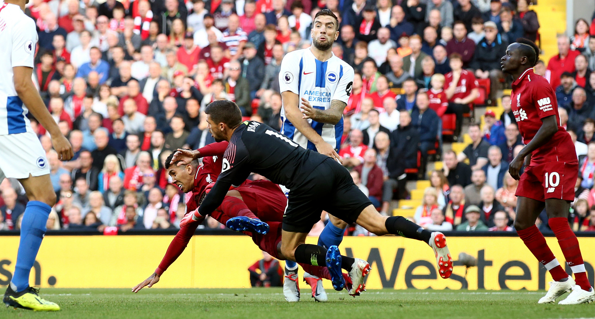 Ryan punches the ball against Liverpool Ryan punches the ball against Liverpool
