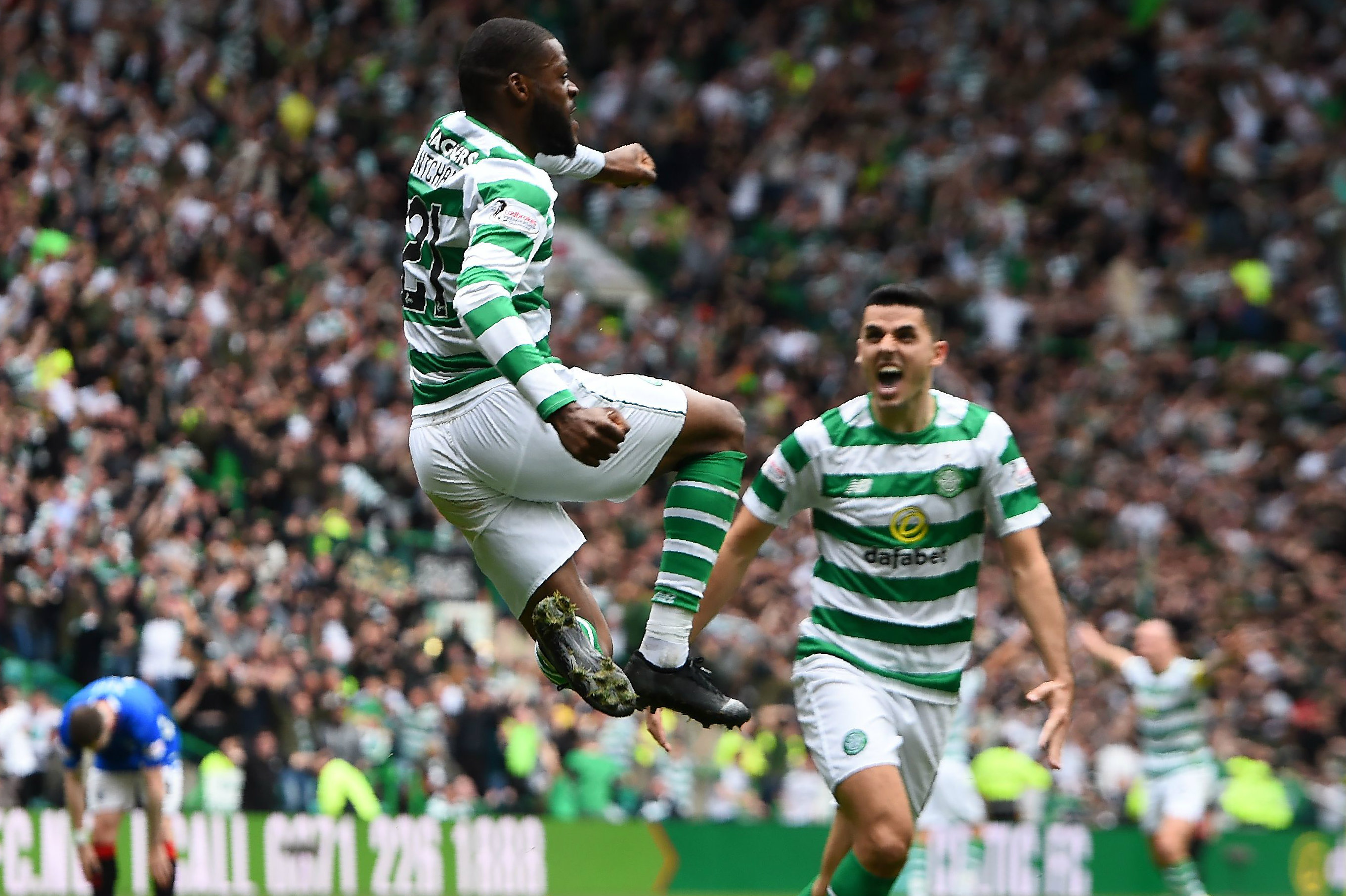 Tom Rogic celebrates Olivier Ntcham's goal. Tom Rogic celebrates Olivier Ntcham's goal.