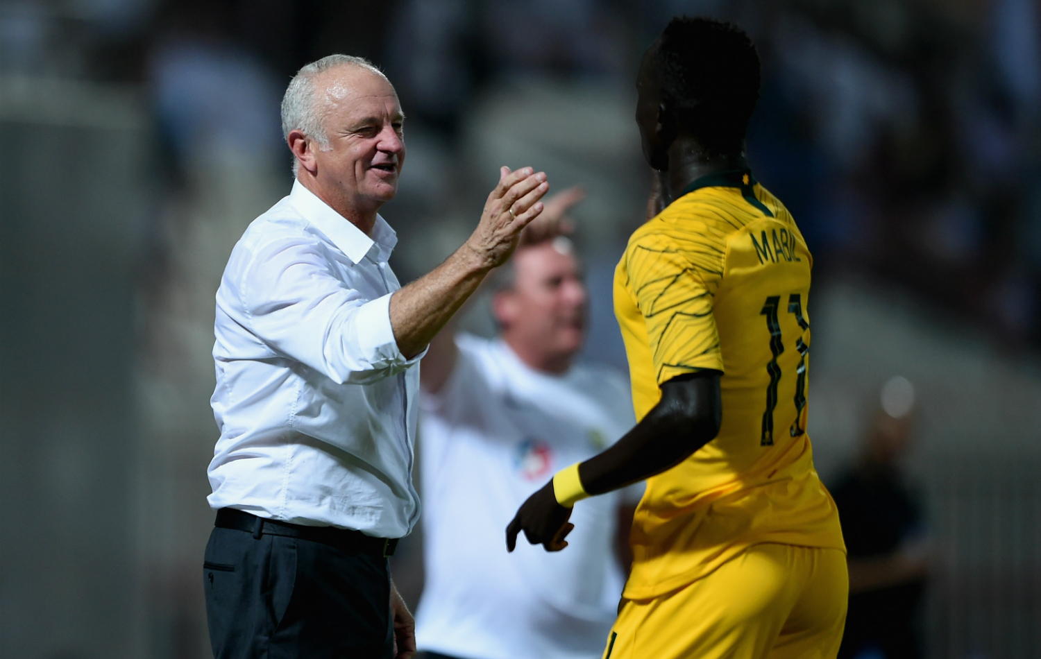Graham Arnold and Awer Mabil Graham Arnold and Awer Mabil