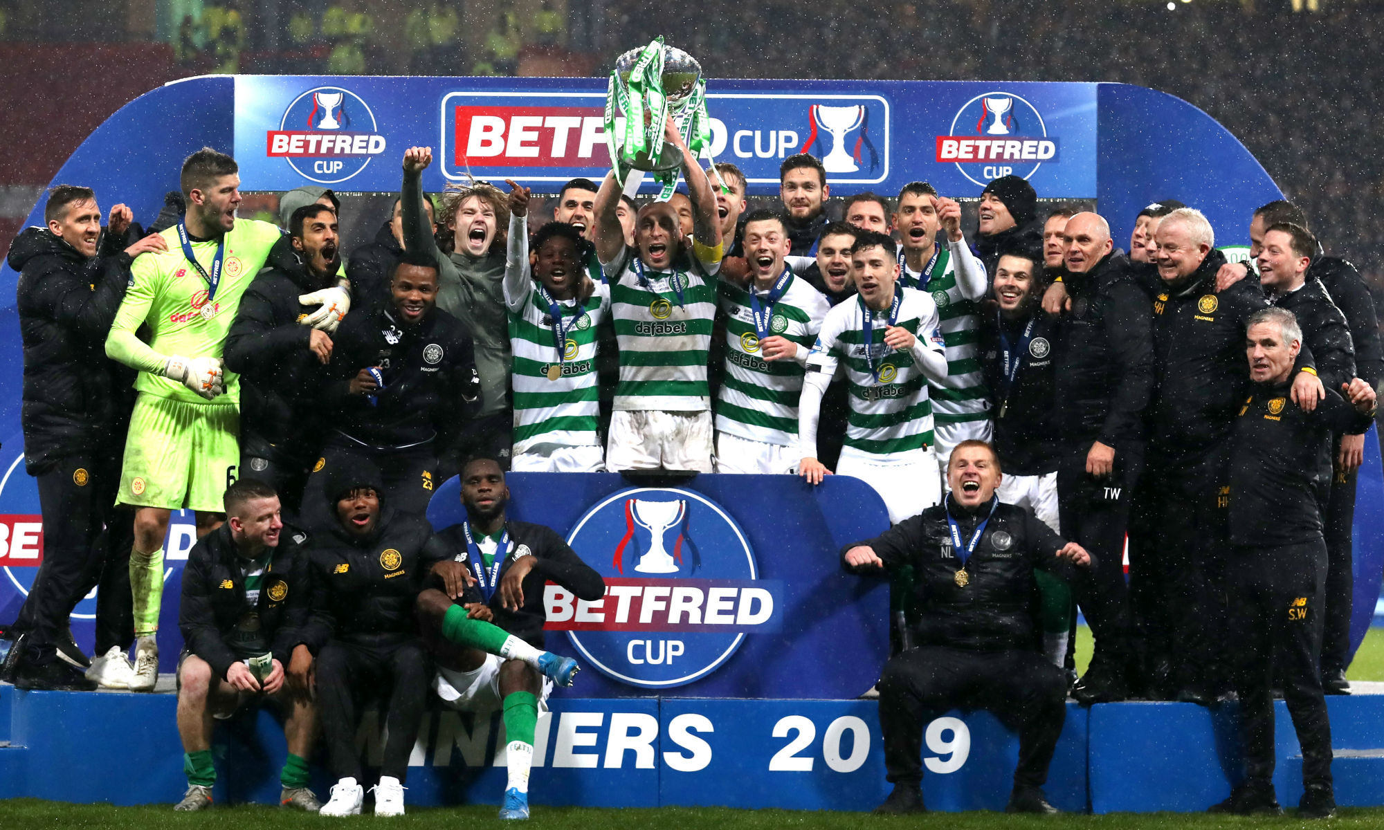 Rogic celebrates with Celtic's victorious League Cup winning squad Rogic celebrates with Celtic's victorious League Cup winning squad