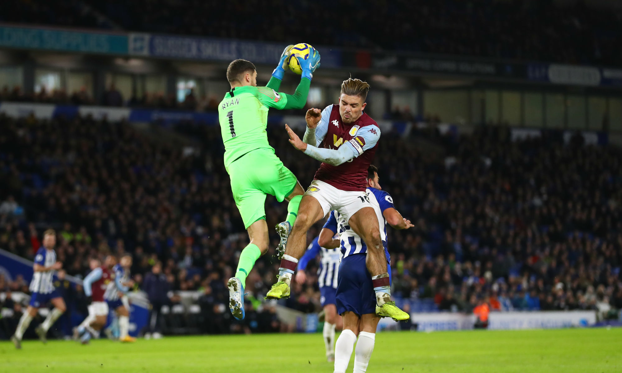 Socceroos number one Ryan claims a high cross under pressure from Jack Grealish. Socceroos number one Ryan claims a high cross under pressure from Jack Grealish.