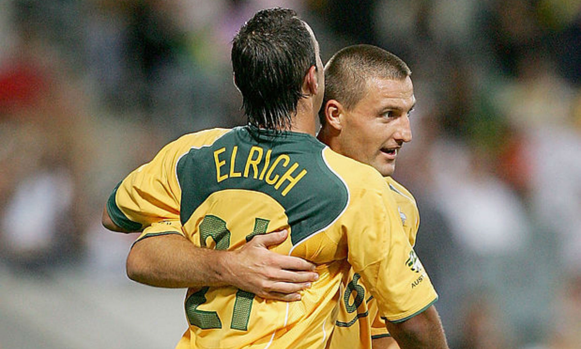 Zdrilic celebrates his late goal with Ahmad Elrich Zdrilic celebrates his late goal with Ahmad Elrich