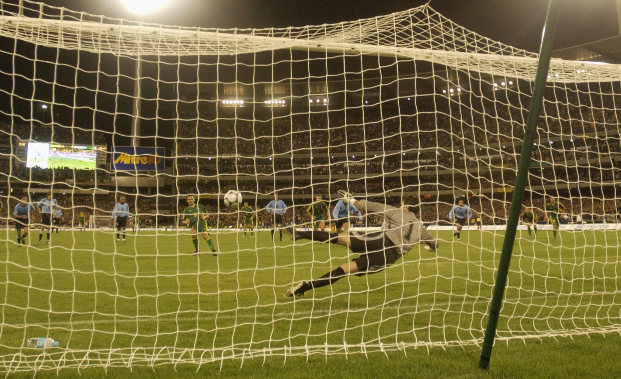 Kevin Muscat scores from the penalty spot Kevin Muscat scores from the penalty spot
