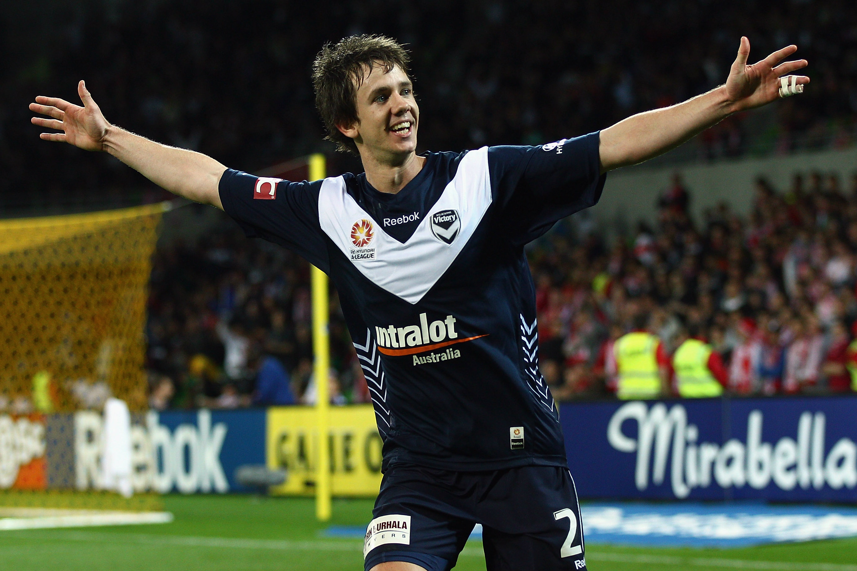 Robbie Kruse celebrates a goal during his first stint with Victory Robbie Kruse celebrates a goal during his first stint with Victory