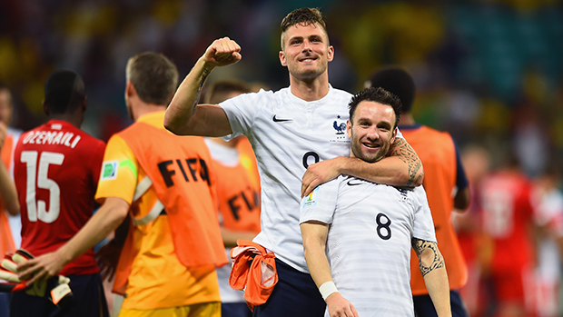 Olivier Giroud and Mathieu Valbuena of France celebrate after defeating Switzerland. Olivier Giroud and Mathieu Valbuena of France celebrate after defeating Switzerland.