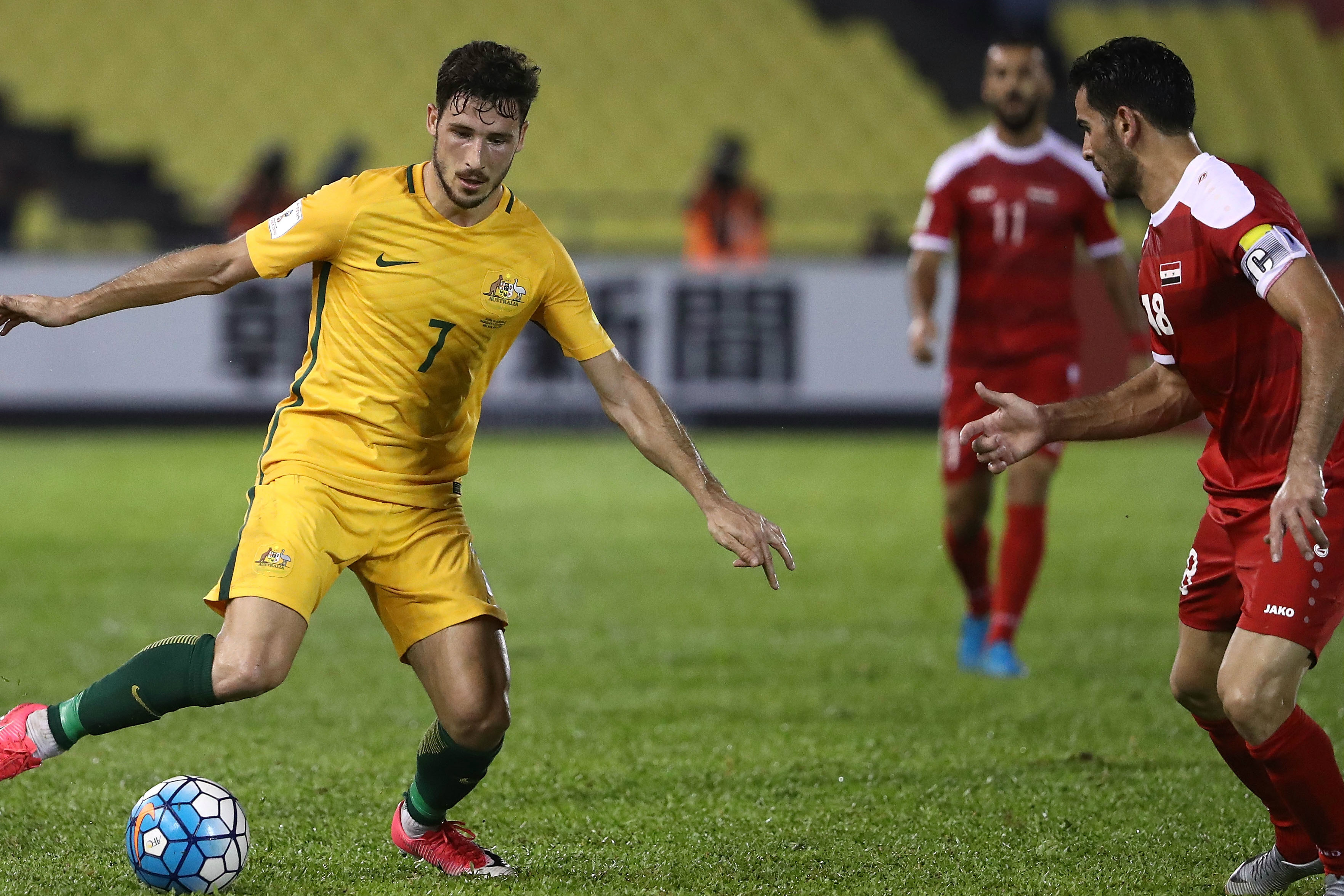 Mat Leckie on the ball against Syria