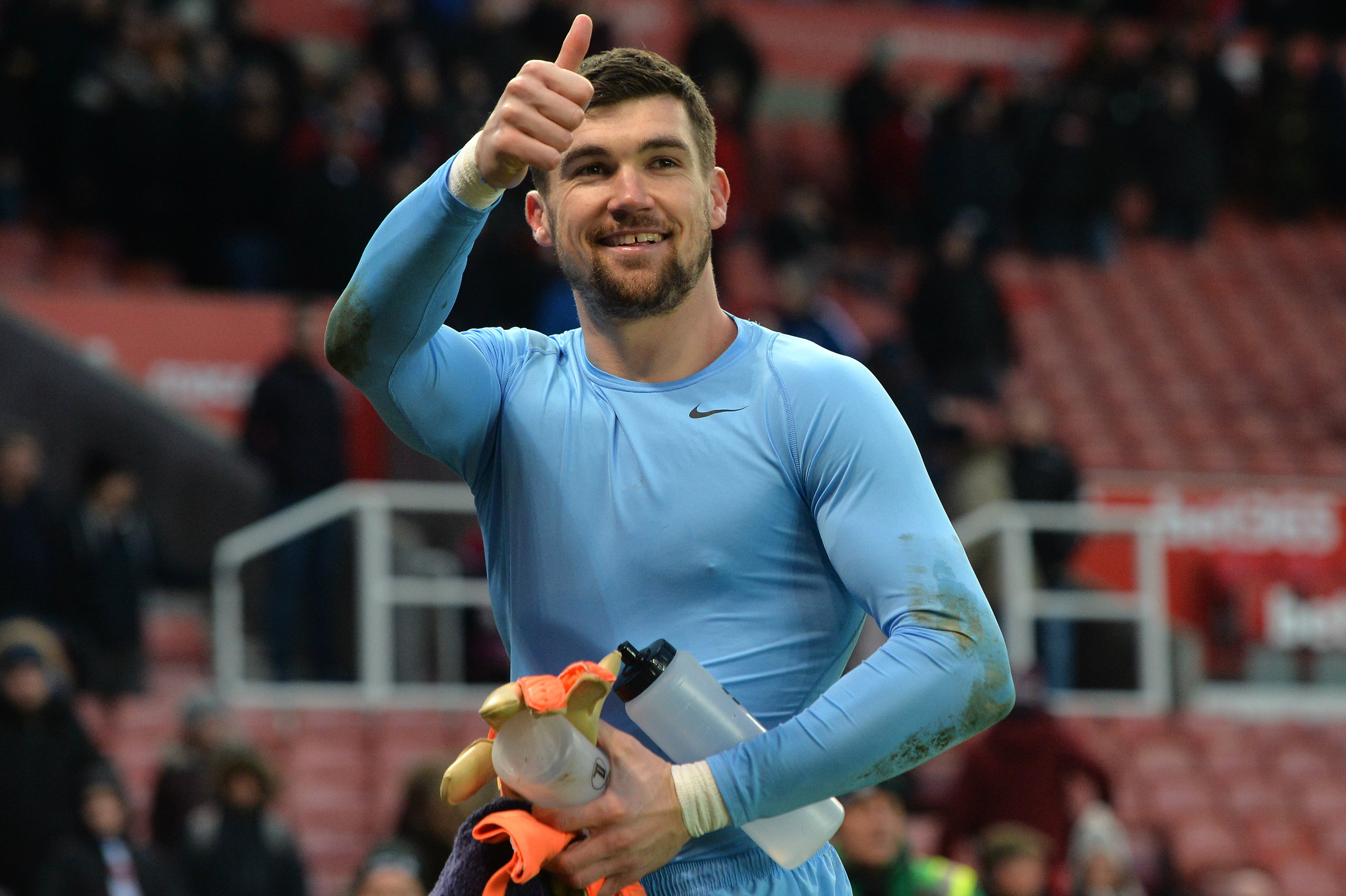 Mat Ryan acknowledges the fans at the bet365 Stadium.