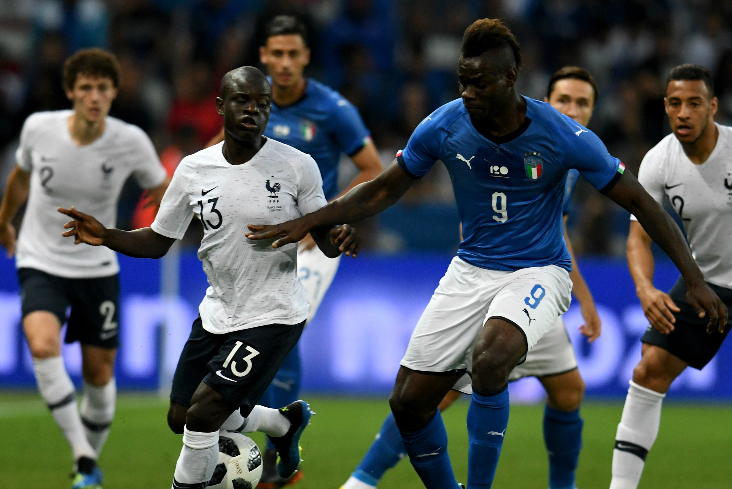 N'Golo Kante up against Italy's Mario Balotelli.