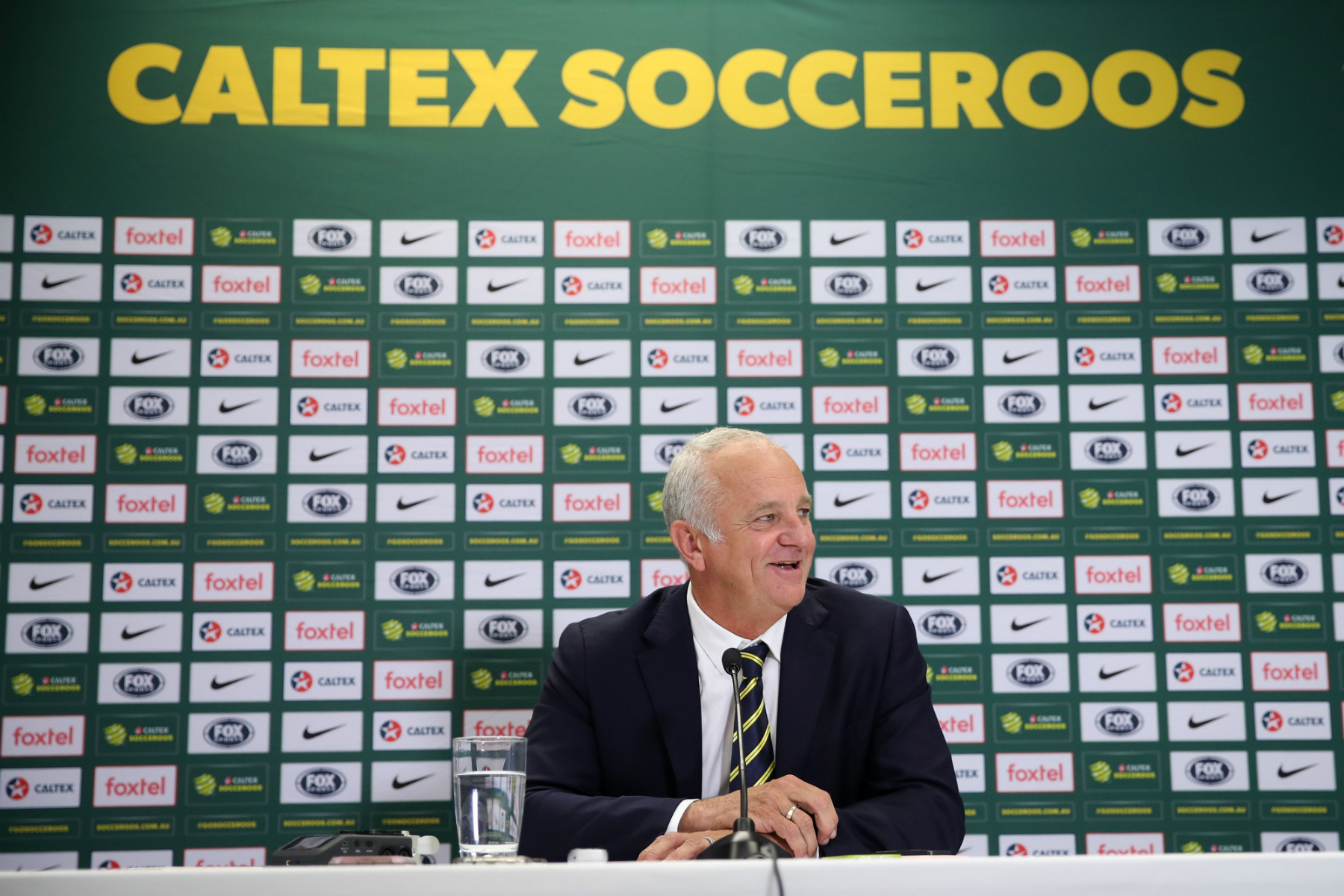 Graham Arnold sits in his press conference for the Caltex Socceroos
