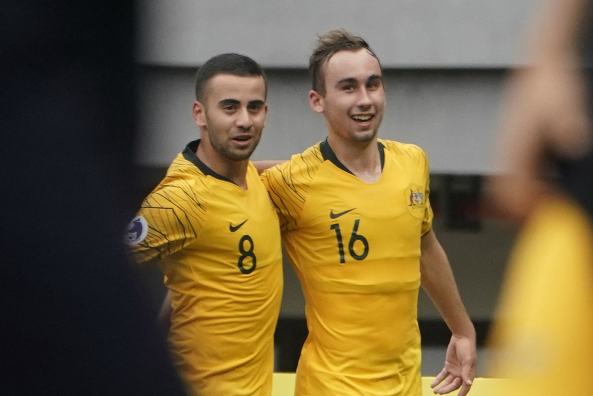 Young Socceroos celebrate a goal