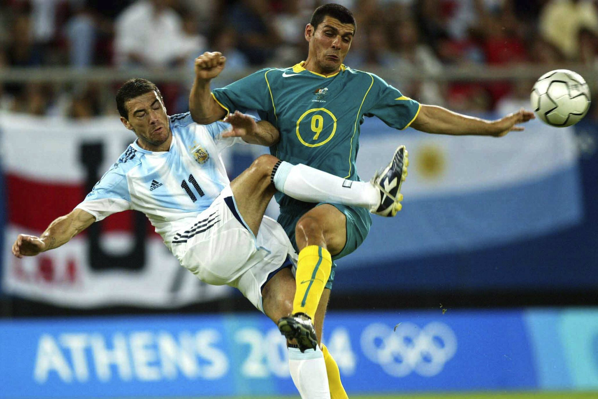 John Aloisi in action against Argentina at the 2004 Olympics