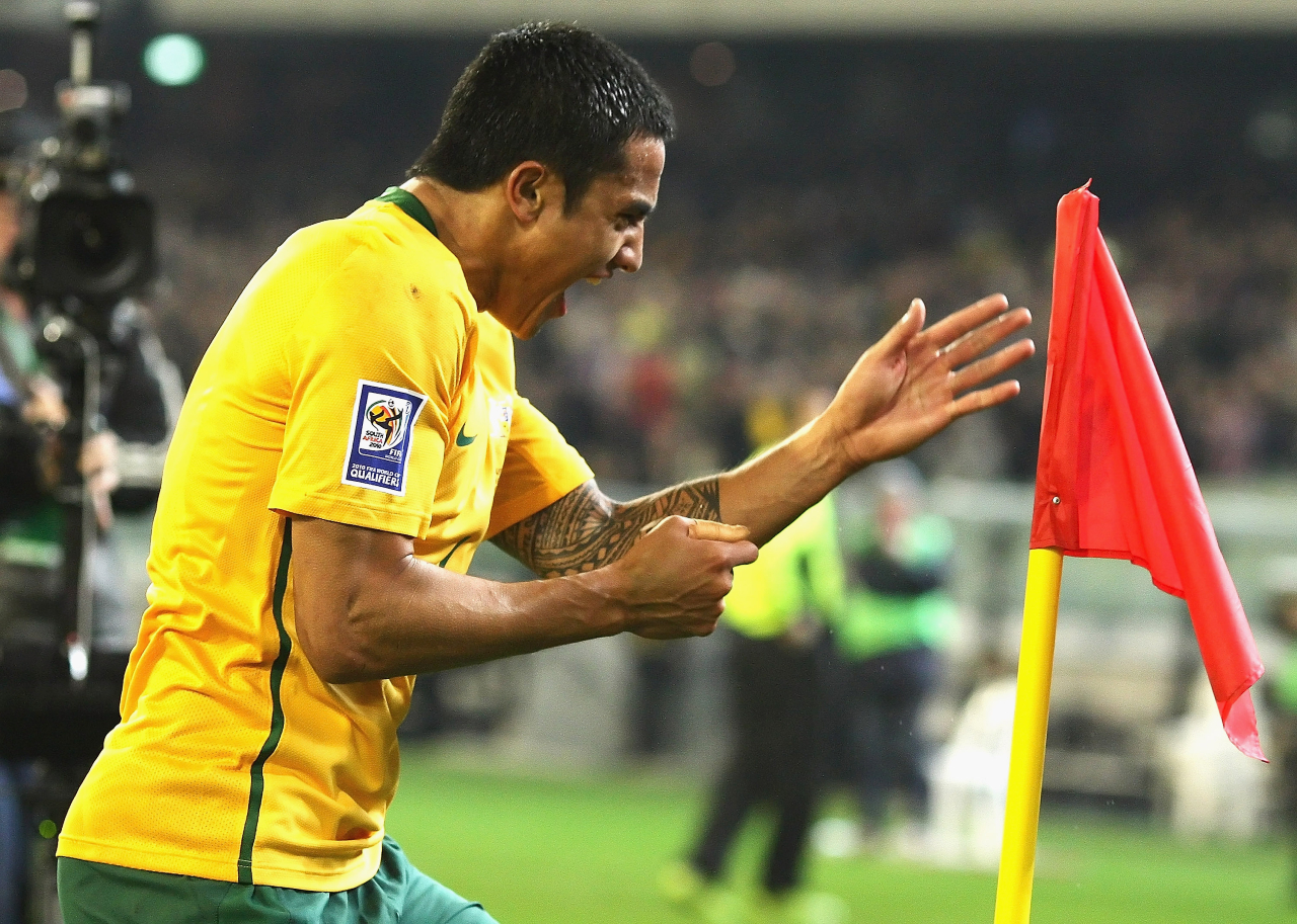 Tim Cahill celebrates one of his two goals against Japan in a 2009 victory