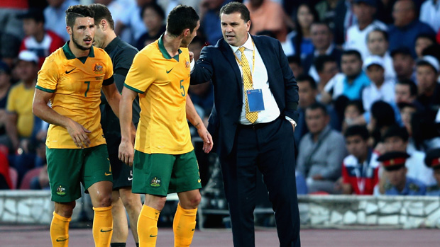 Ange Postecoglou gives instructions to midfielder Mark Milligan during a FIFA World Cup Qualifier.