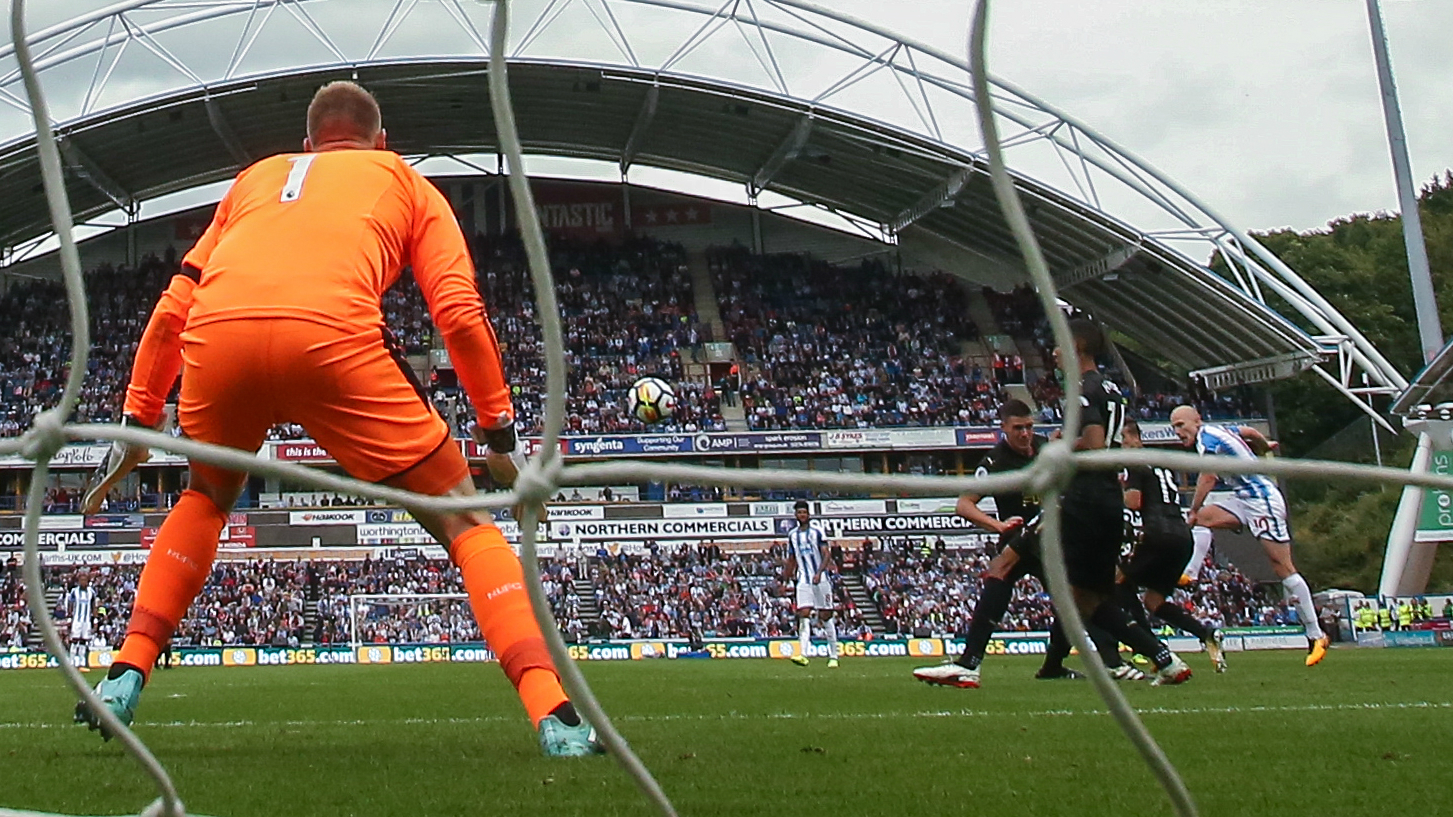 Aaron Mooy curls in a stunning strike as Huddersfield Town beat Newcastle United in the EPL.