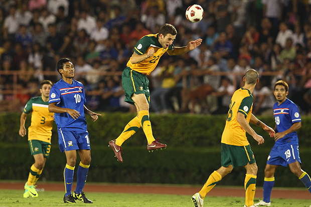Spiranovic clears the ball against Thailand in Bangkok, 2011.
