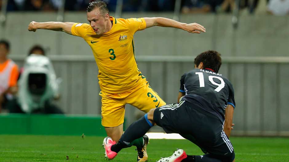 Brad Smith goes down under a mis-timed tackle from a Japanese defender.