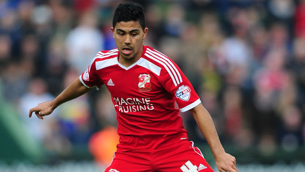 Massimo Luongo in action for former club Swindon Town.