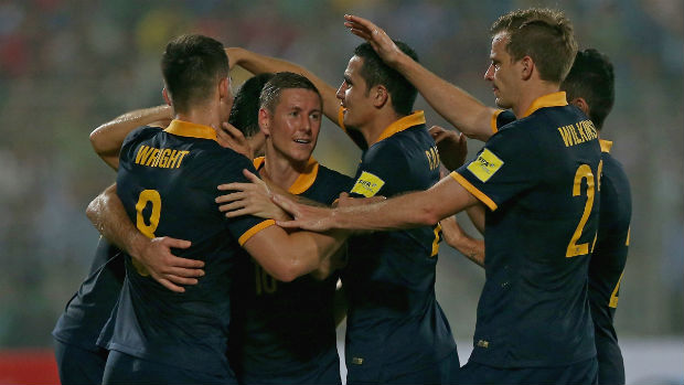 The Socceroos celebrate scoring against Bangladesh in their November international.