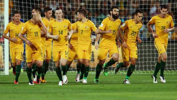 The Caltex Socceroos celebrate Mile Jedinak's first-half penalty against Tajikistan.