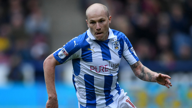 Caltex Socceroos star Aaron Mooy is set for his toughest test yet as Huddersfield Town fight to earn promotion to the Premier League.