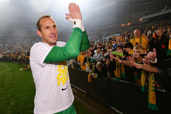 Mark Schwarzer salutes the crowd after the Socceroos qualified for the World Cup.