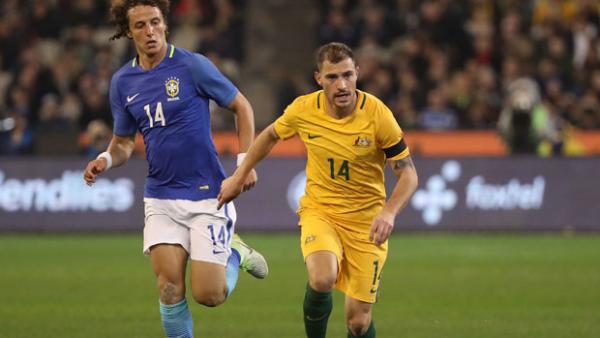 James Troisi on the ball during Australia's 4-0 loss to Brazil.